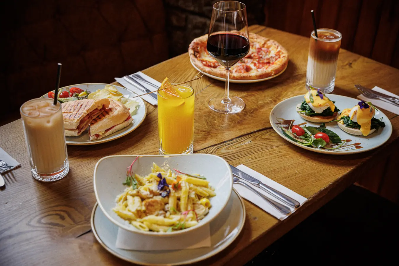 A table of plates and drinks at Mary’s